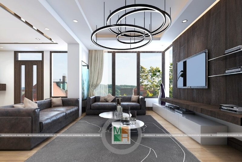 Mẫu thiết kế phòng khách chung cư sang trọng với bộ sofa bọc da cao cấp tạo điểm nhấn nổi bật cho căn phòng Thiết kế phòng khách chung cư