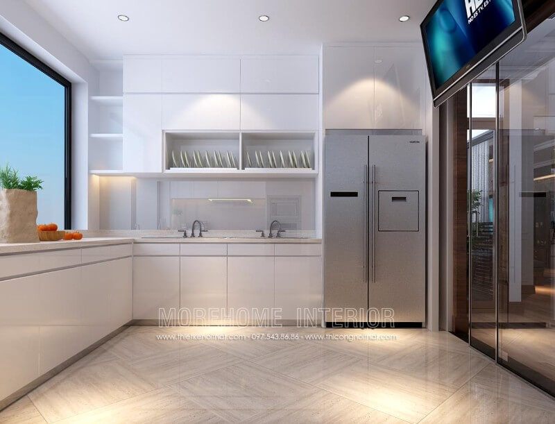 Trang trí nội thất của căn hộ hiện đại bằng các mẫu tủ bếp màu trắng.