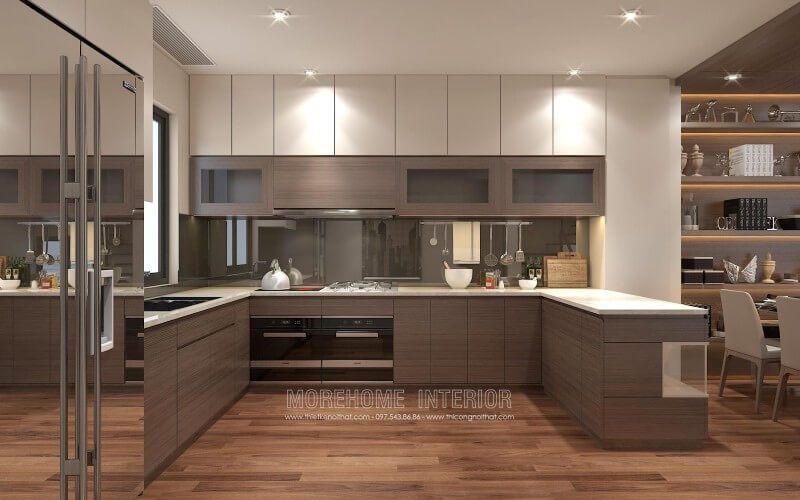 Tủ bếp chung cư có kiểu dáng chữ U với các khu vực được phân bố hợp lý, tạo nên một không gian nhà bếp đồng bộ và hài hòa.